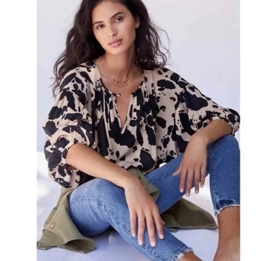 Coreylynncalter from Anthropologie animal print puffed sleeves top
